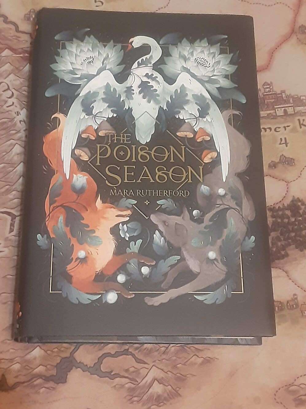 The Poison Season by Mara Rutherford signed Owlcrate hardcover with bookmark. =)
